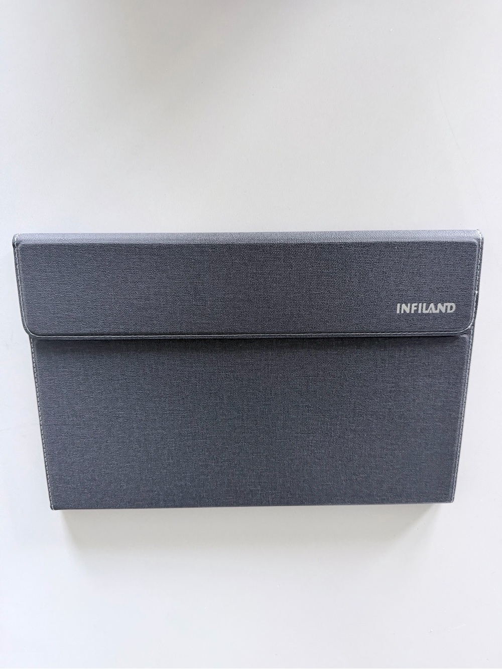 INFILAND multi-angle folio protective stand case designed for tablet computers.
